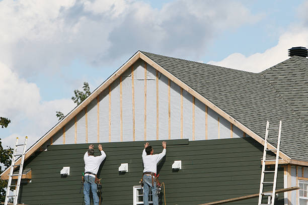 Professional Siding Installation technician working in Fort Lupton, CO